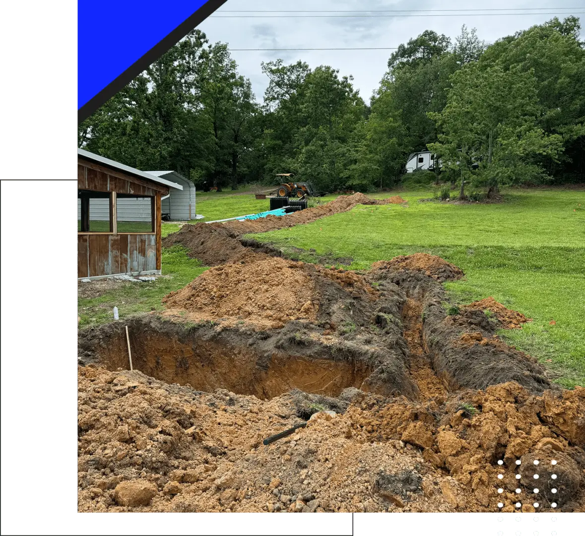 Open field trenching for underground utilities.